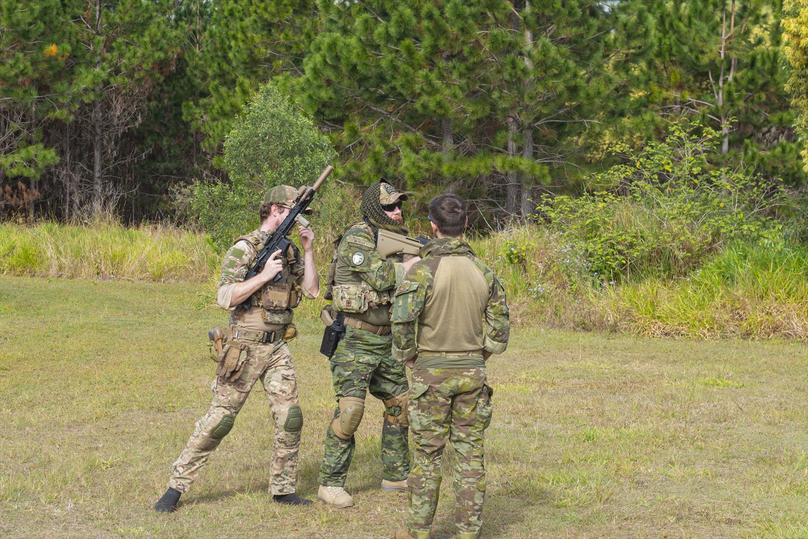 White Raven Milsim players advancing in a gel ball milsim engagement