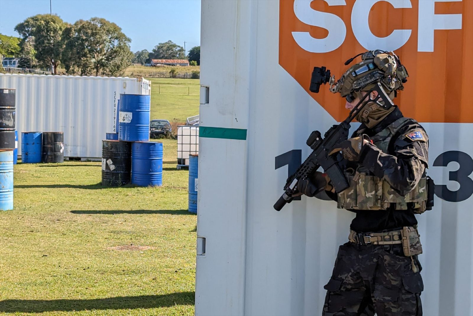 Two White Raven Milsim players trading fire at close range