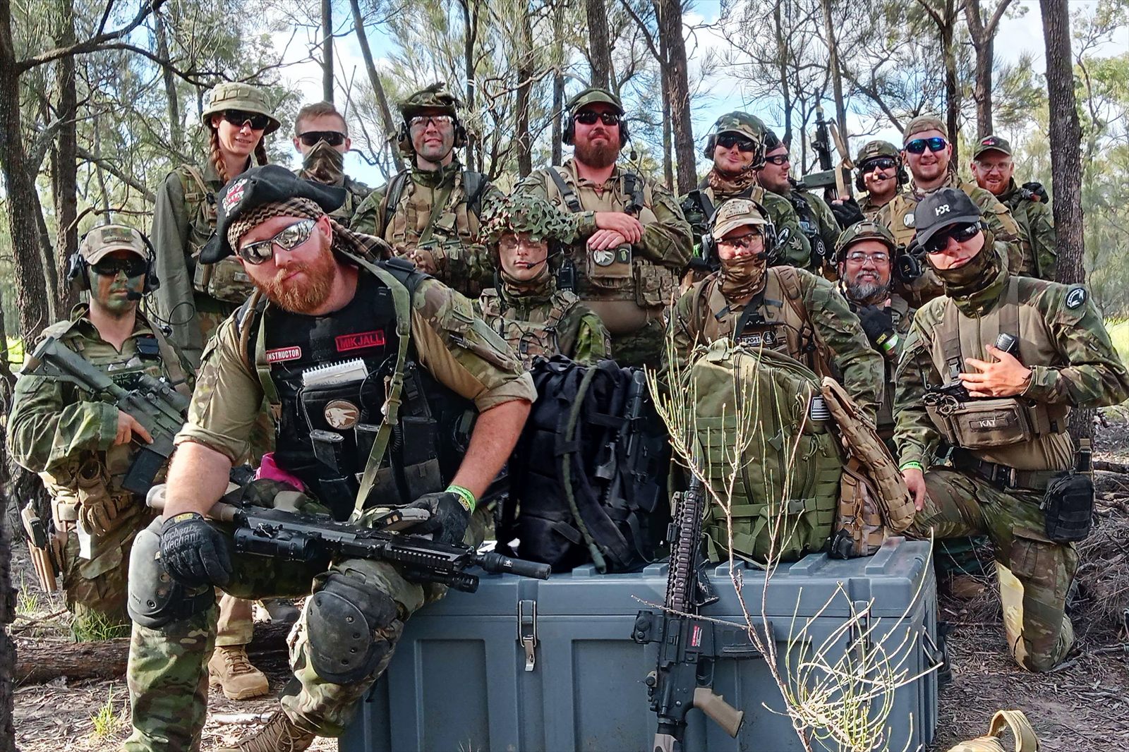 White Raven Milsim team assembled for a group photo in full kit