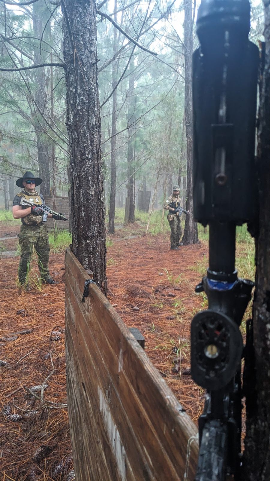 White Raven Milsim members continuing a drill in wet conditions